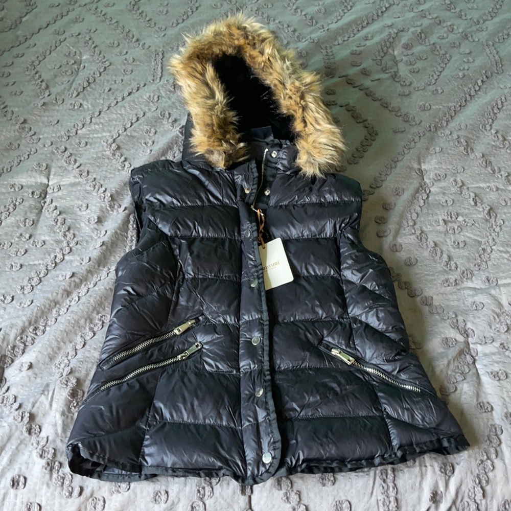 Puffy vest with faux fur hood. Size medium.